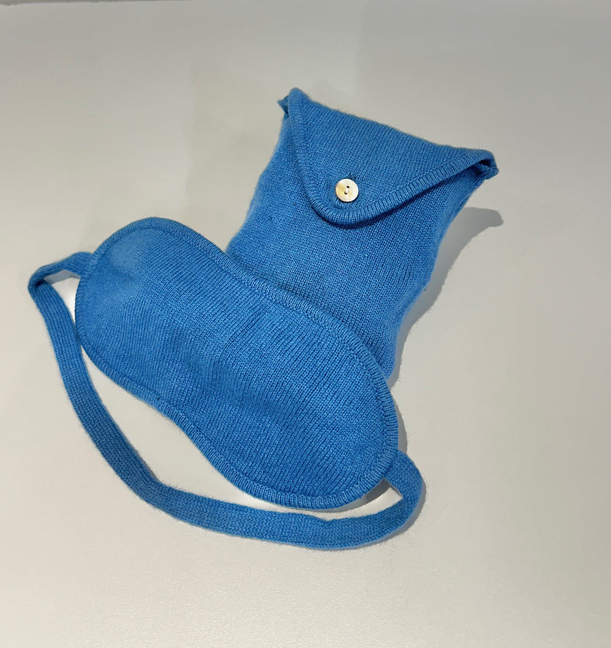 Cashmere sleep mask showing adjustable strap and fit
