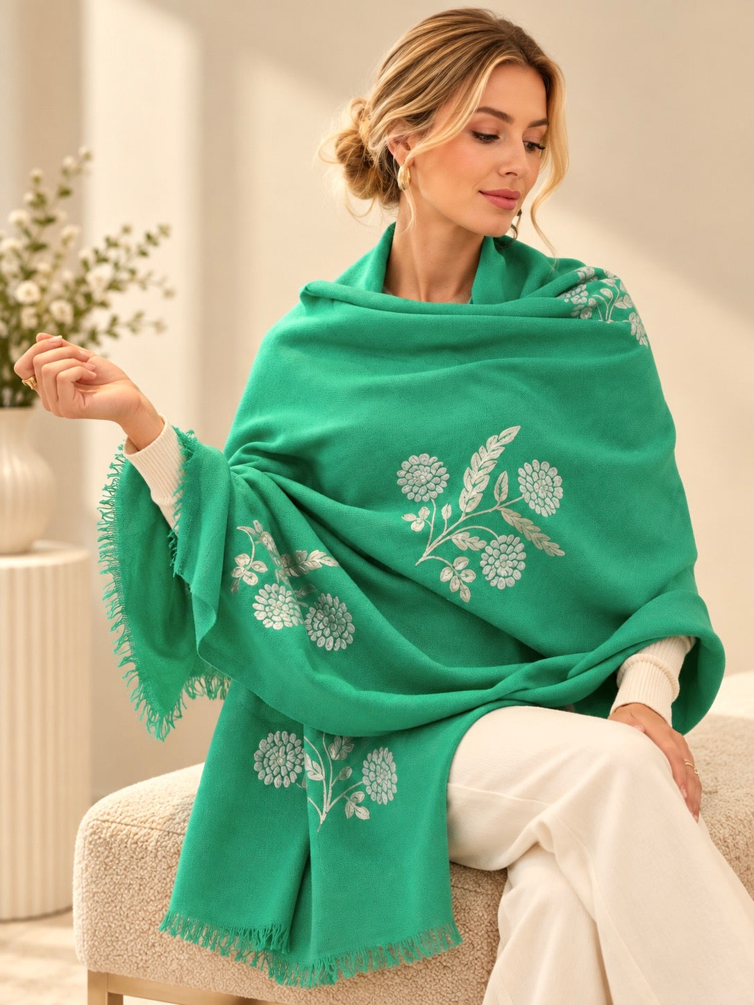 A model wearing a red cashmere shawl in featherweight light cashmere