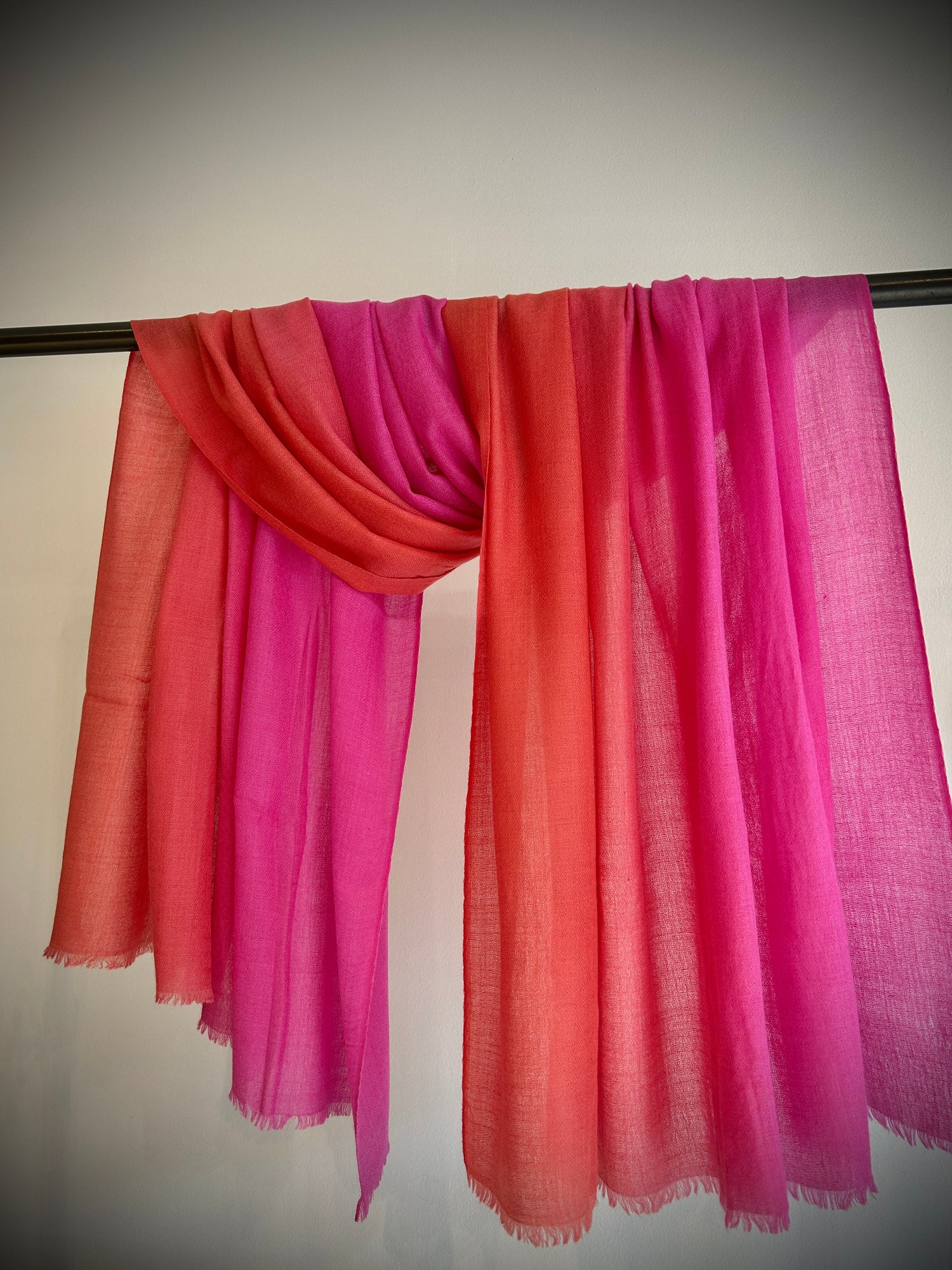 Two tone shawl in shades of pink and coral