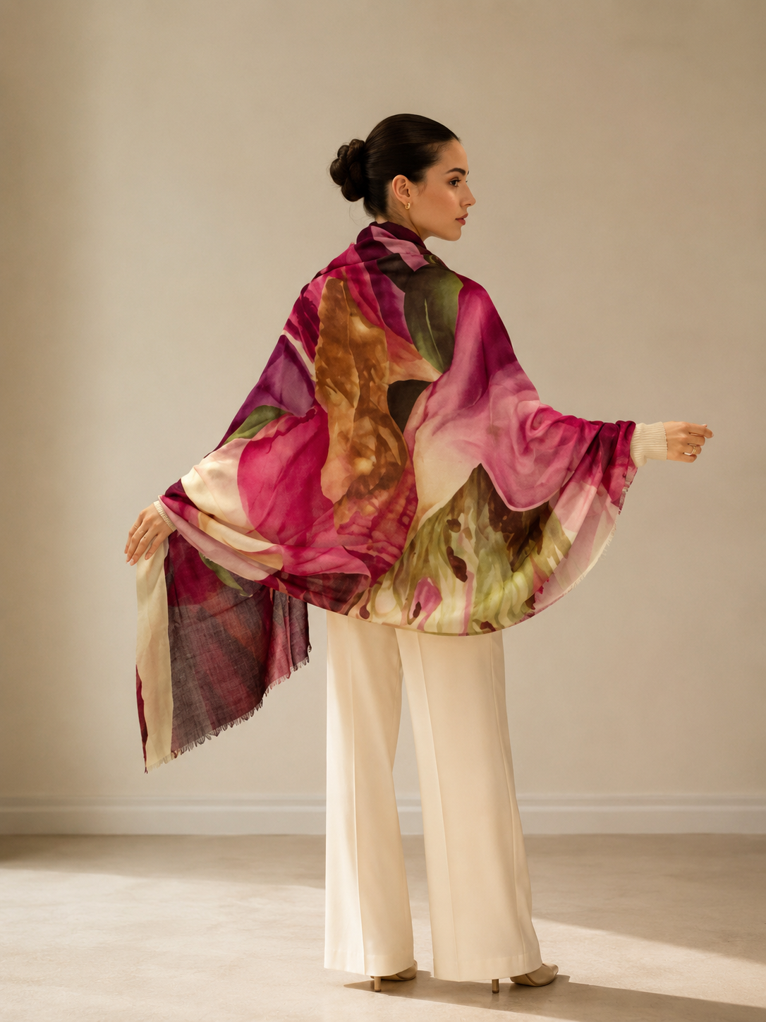 Luxury handwoven cashmere shawl with bold fuchsia and green abstract floral print — back view