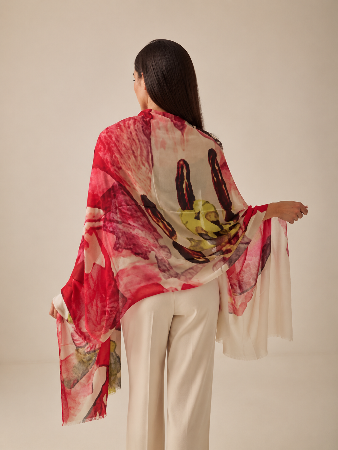 A beautiful hand loomed cashmere scarf worn as a wrap