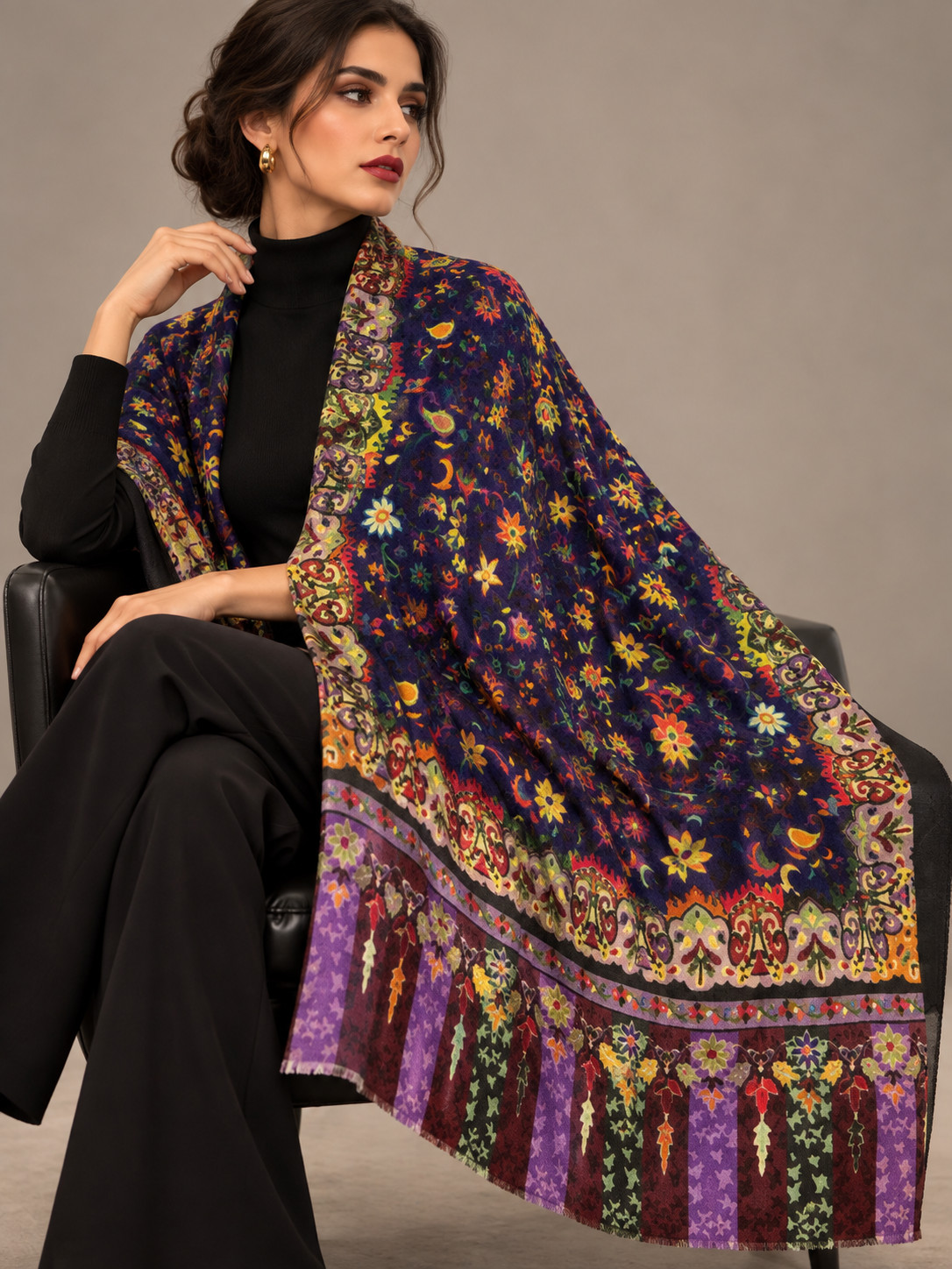 A beautifully handwoven cashmere shawl with intricate pattern 