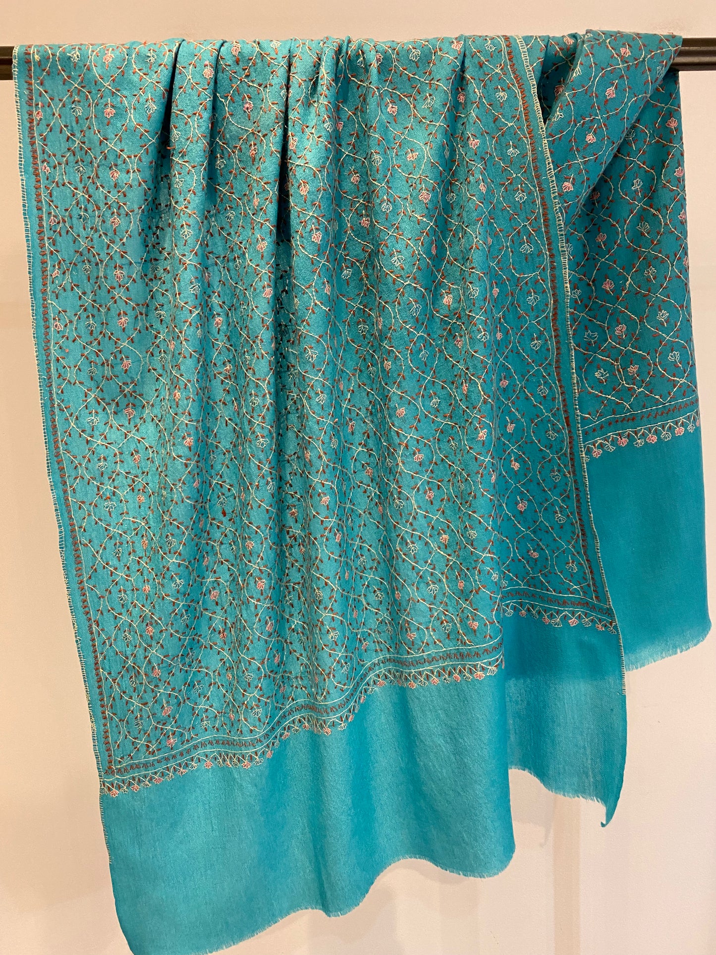 Kashmiri shawl draped elegantly - luxurious cashmere texture
