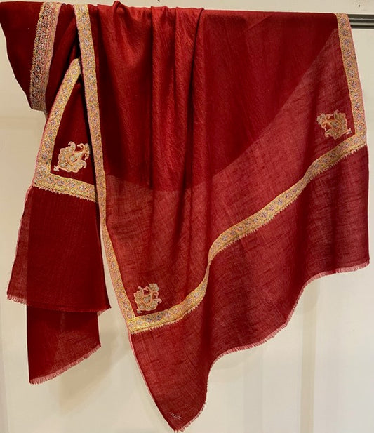 Close-up of Kashmiri shawl showing detailed hand embroidery work