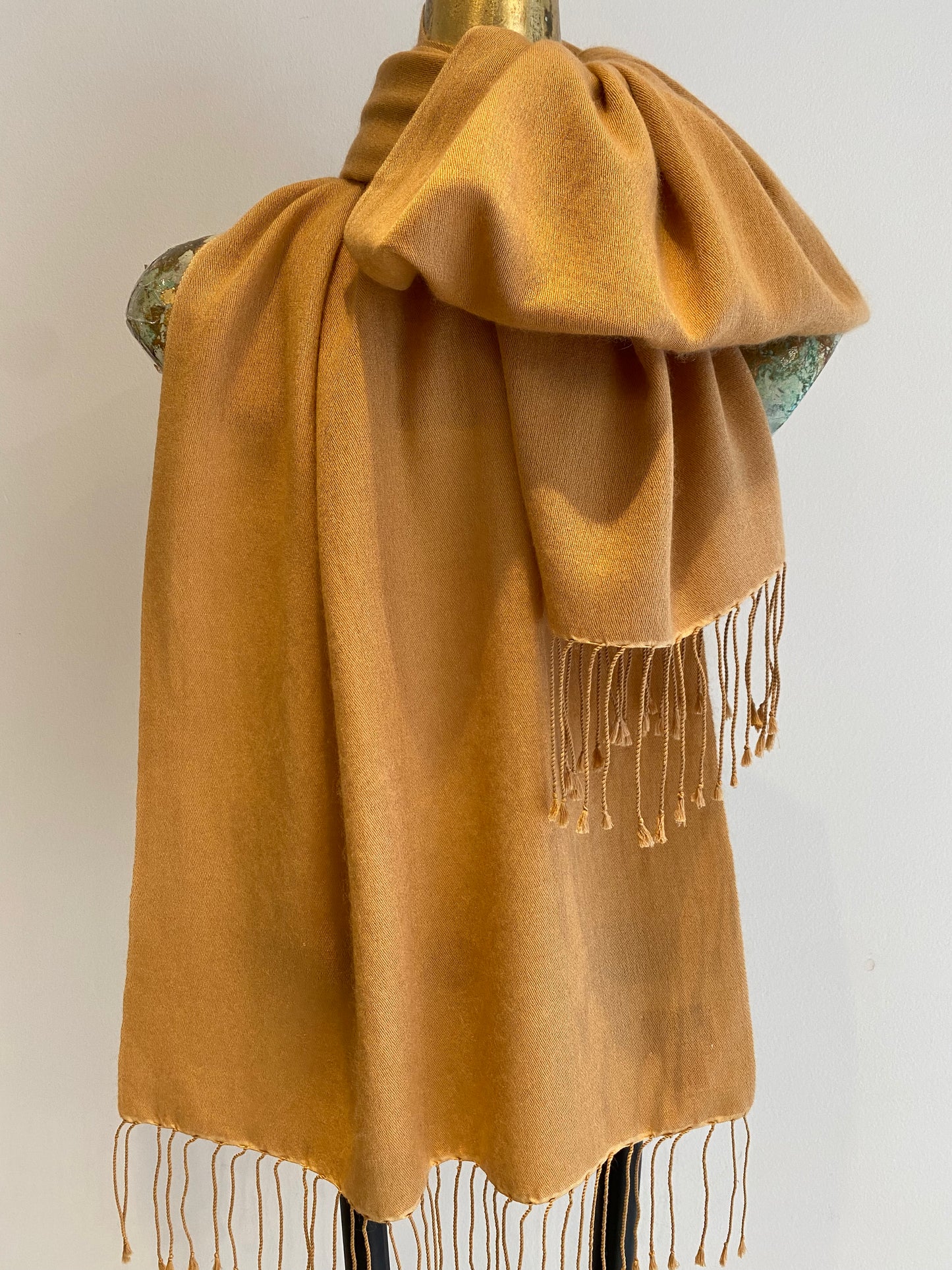 Pashmina scarf styled to showcase versatility and elegance