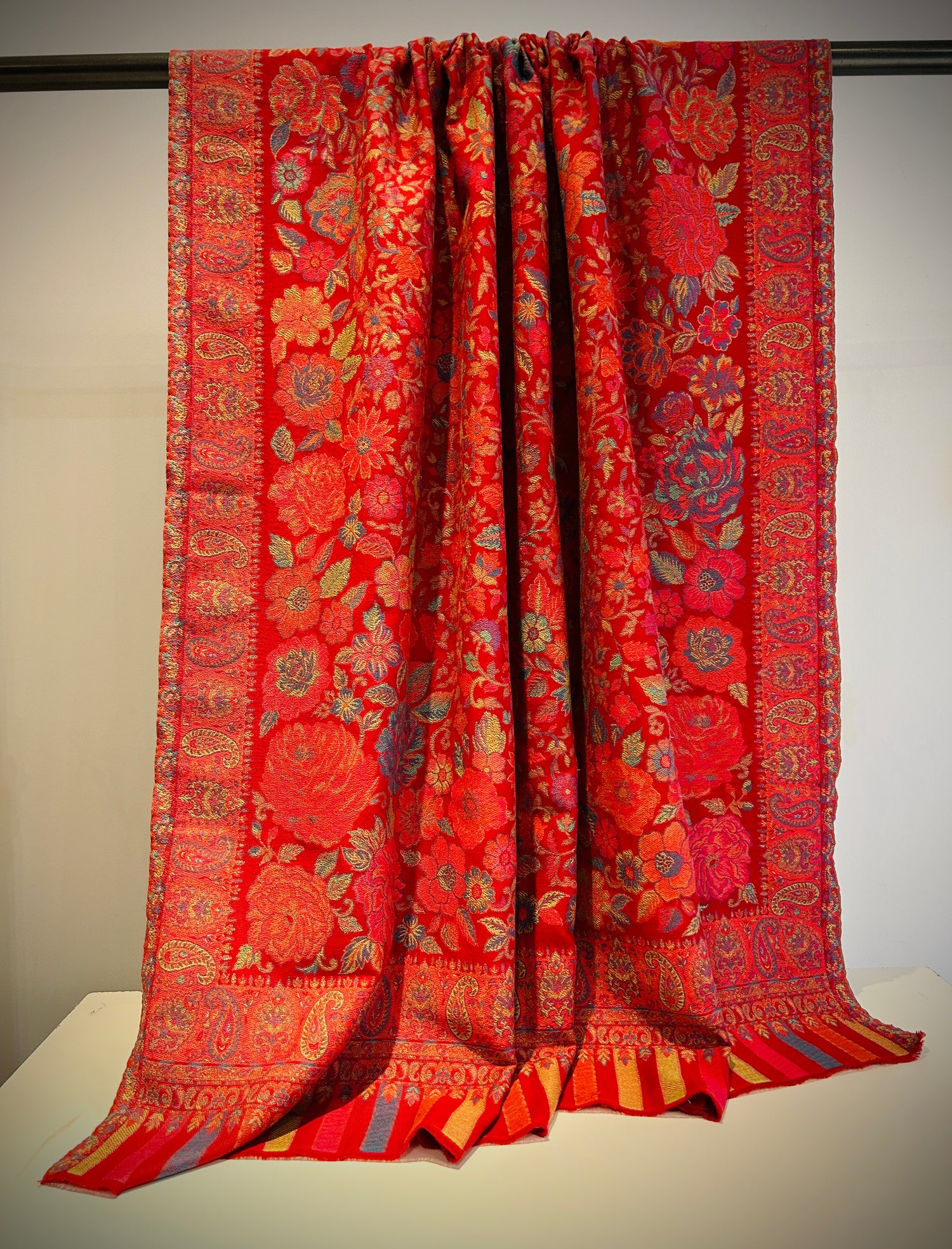 Hand-woven floral wool shawl with intricate botanical pattern - artisan craftsmanship