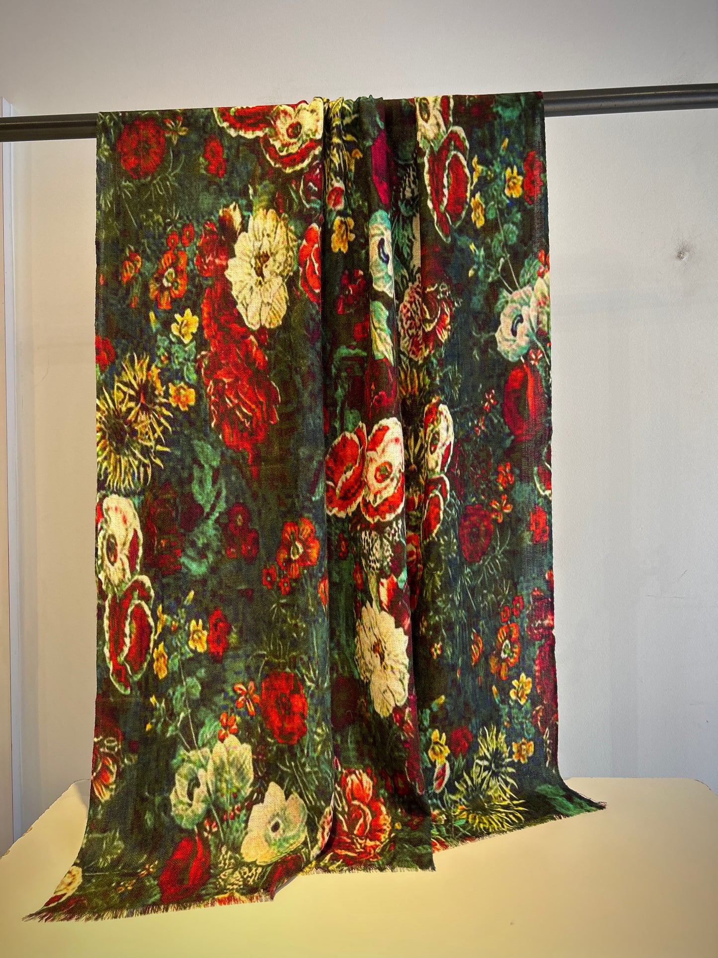 Merino wool and silk scarf detail highlighting premium fiber blend"