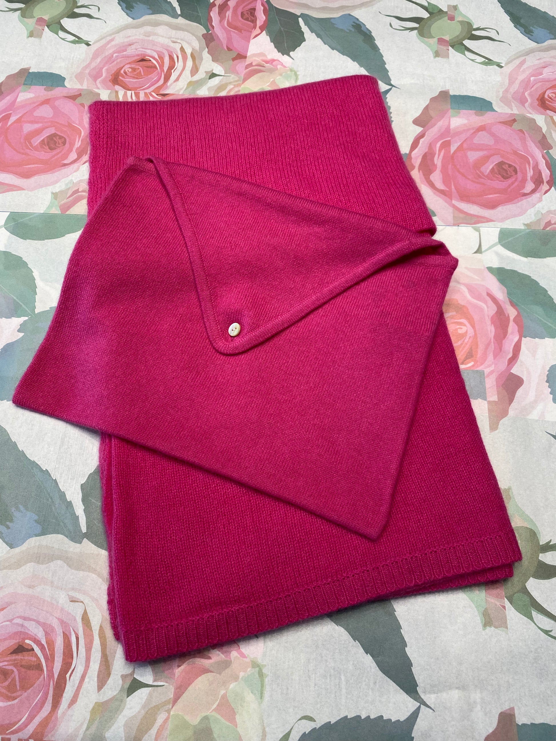 Cashmere travel blanket folded compactly for easy travel and storage
