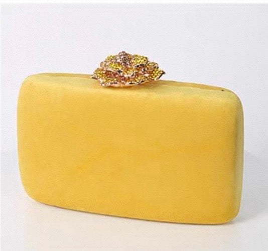Yellow clutch with rose clasp