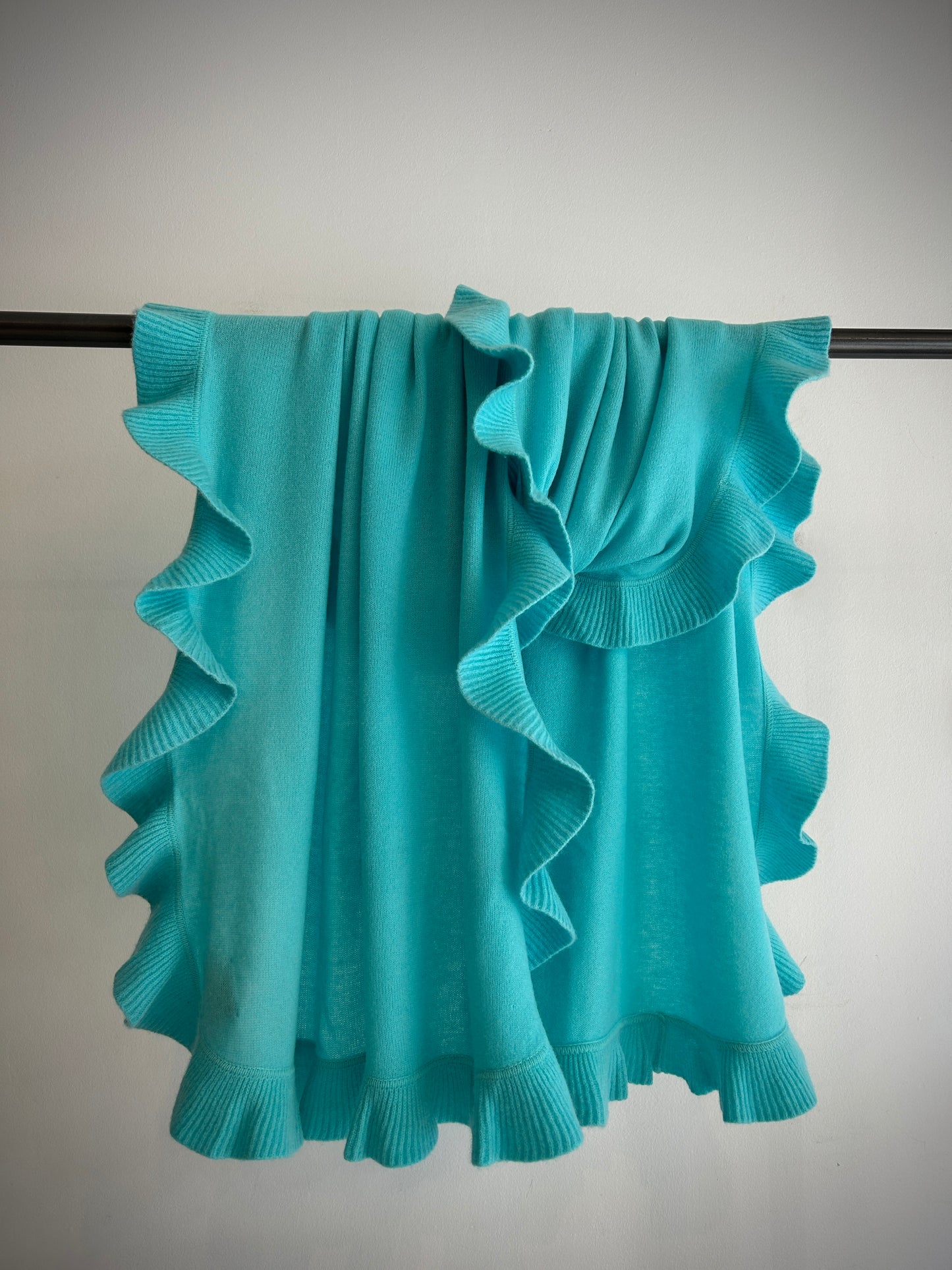 A turquoise cashmere ruffled shawl