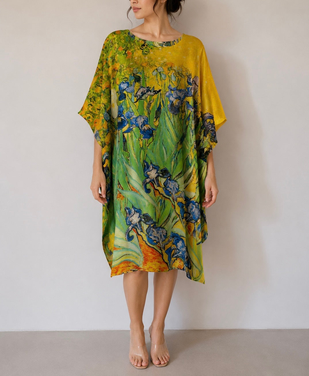 Model wearing a floral silk tunic