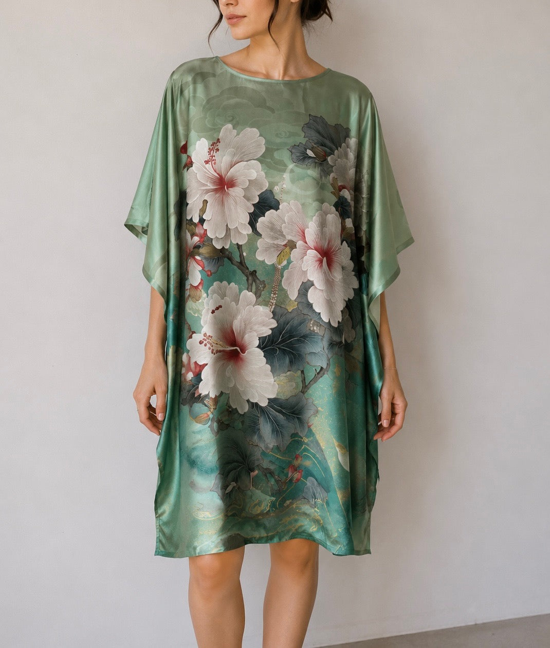 Model wearing loose fitting silk tunic
